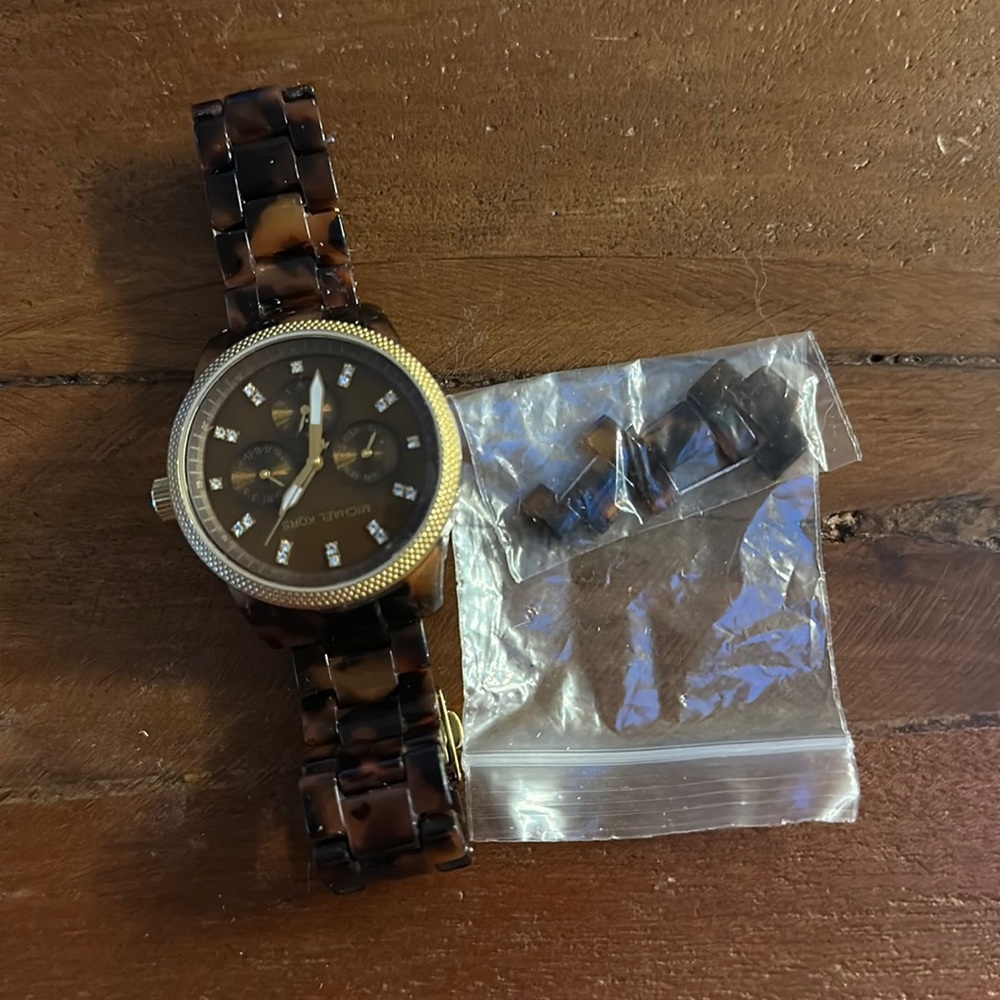 tortoise shell Michael Kors watch with extra links